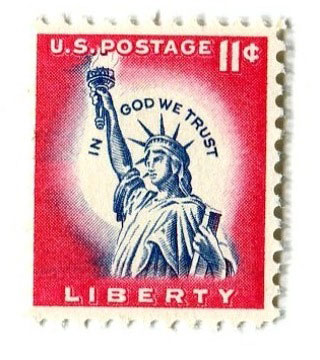 First stamp bearing the motto “IN GOD WE TRUST”.